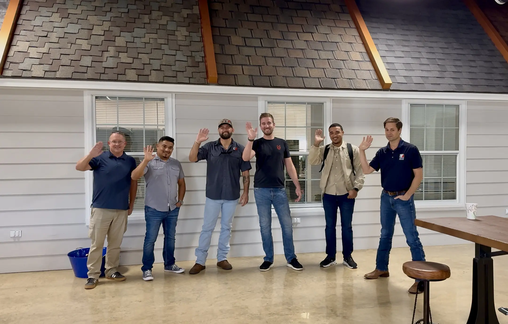 https://avcoroofing.com/wp-content/uploads/2025/05/home-team-waving-avco-roofing-tyler.webp
